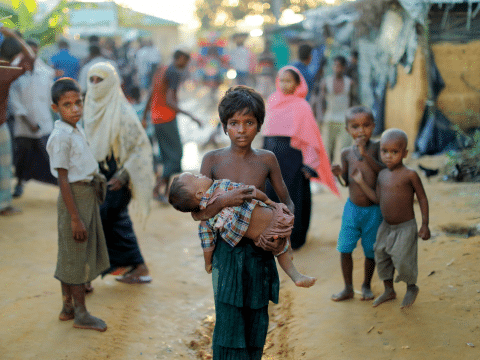 End racism toward refugees Cardinal Bo says