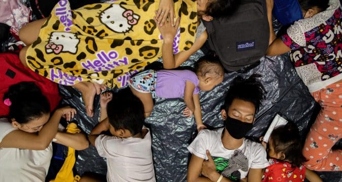 Aid efforts hampered by Covid-19 after typhoon barrels through Philippines