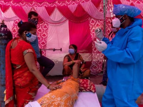 Saving lives a priority as pandemic rampages through India