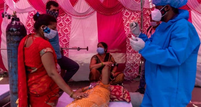 Saving lives a priority as pandemic rampages through India