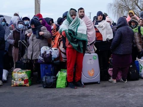 Pitching in to evacuate Ukrainians refugees heading west