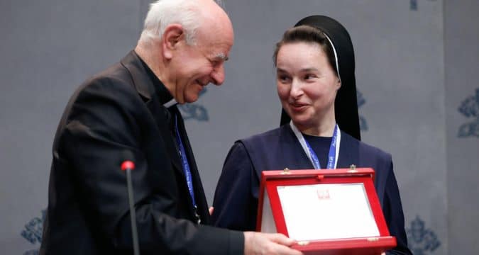 Only a united global family can fix crises, archbishop says