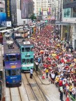 Participants during the rally, many holding yellow umbrellas, packed two lanes of Hennessy Road. The last of the long line of marchers reached Admiralty at around 7.45pm.