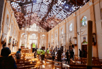 Police examine the devastation after the bombing of St. Sebastian Church in Negombo, Sri Lanka, on April 21. Photo: CNS/Reuters