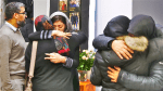 Family and friends embrace each other on January 11 at the Imam Hussein Islamic Society mosque in Edmonton, Alberta. Photo: CNS/Bob Roller
