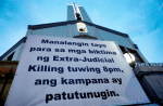 A sign posted outside a Catholic Church in Manila, Philippines, reads, “Let us pray for the victims of extrajudicial killings, bells will toll at 8.00pm.” Photo: CNS/Reuters
