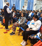 Nonito Limchua (left) leading a prayer for forgiveness.