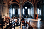A man prays inside an empty Catholic church in Milan on March 1. Photo: CNS/Reuters