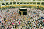 Pilgrims circle the Kaaba at the Great Mosque of Mecca (al-Masjid al-Haram) in better times. Photo by ekrem osmanoglu on Unsplash