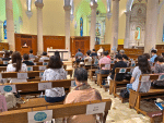 People attending Mass at the Cathedral of Immaculate Conception, Caine Road, on June 1. Signs indicate that they should sit one metre apart from one another.