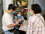Parishioners from Mother of Christ Church, Sheung Shui, distribute daily necessities to the needy in March this year.
