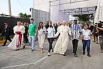 The youngest Hong Kong delegate to World Youth Day 2019 in Panama, Constance Liu, fourth from left, holds hands with Pope Francis as one the young people representing the five continents. Photo: Facebook page of @Youtboilingpoint