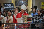 Bishop Pabillo leading a candle-lighting ceremony. File photo: UCAN/Vincent Go