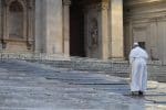 Pope Francis walks up stairs as he arrives for a prayer service in an empty St. Peter’s Square on March 27. Photo: CNS/Evandro Inetti, pool