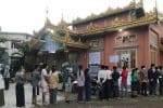 Voters line up to cast their ballots at a polling station in a Buddhist hall in Mandalay on November 8. Photo: UCA News