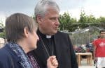 Daniela Pompei of the Sant’Egidio Community confers with Cardinal Konrad Krajewski, the papal almoner, during a May 2019 visit to the Moria refugee camp on the Greek island of Lesbos. Photo: CNS