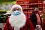 A Santa Claus mannequin sports a facemask. Photo: CNS/Reuters