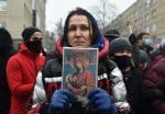 A woman holding a religious icon at a rally in support of jailed Russian opposition leader, Alexei Navalny, in Moscow on January 31. Photo: CNS/Reuters