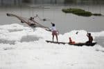 Fishing in the polluted waters of the Yamuna River on World Water Day in New Delhi, India, on March 22. Photo: CNS/Reuters