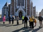 Parishioners stand outside Sts. Anne and Mary Cathedral in Cork, Ireland, on April. Photo: CNS