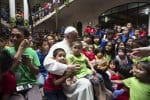 Pope Francis with young people at a home for former street children in Manila, during his visit to the Philippines in 2015. Photo: CNS/L’Osservatore Romano via Reuters