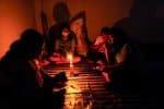 Villagers fleeing the violence in Myanmar take refuge at a school in the Thai border village of Mae Sam Laep. Photo: CNS/Athit Perawongmetha, Reuters