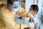 The Covid-19 vaccine being administered. Photo by Mufid Majnun on Unsplash
