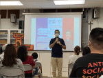 Father Francqueville teaching French at Holy Redeemer parish, Tuen Mun.