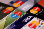 A collection of various credit cards. The Vatican Covid-19 Commission is drawing attention to the need to help families struggling with debt. Photo: CNS/Maxim Zmeyev, Reuters