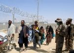 People arrive from Afghanistan through the Friendship Gate crossing point at the border town of Chaman, Pakistan, on August 19. Photo: CNS/Saeed Ali Achakzai, Reuters