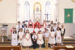 Four children from Rosary parish in Tsimshatsui made their first communion on July 10 and 11 young people received the sacrament of confirmation during a Mass celebrated by John Cardinal Tong Hon, together with the priests of the parish, Father Mario Gutierrez and Father Mike Sloboda.