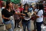 During mid-term elections in 2019, supporters campaign for their candidates outside polling stations in Manila. File photo by UCAN/Angie de Silva