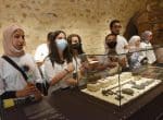 Students from the Jerusalem Hitech Foundry look at archaeological discoveries from the time of Jesus in the Terra Sancta Museum in Jerusalem’s Old City on August 25. Photo: CNS/Debbie Hill