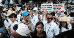 Filipinos protest corruption by wearing white for Mass