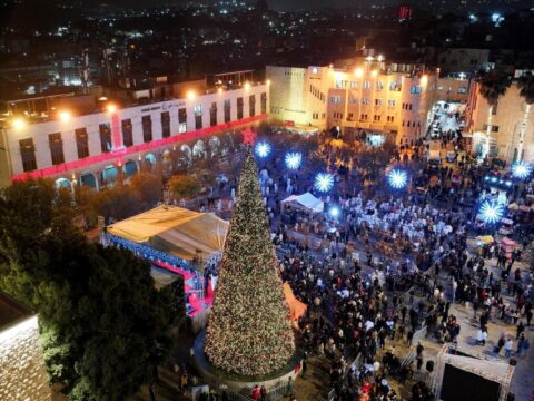 Bethlehem celebrates first Christmas tree lighting since war as pilgrims slowly return Bethlehem celebrates first Christmas tree lighting since war as pilgrims slowly return