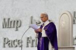 Pope Leo XIV, prays for the victims of the Wang Fuk Court fires during Mass in Beirut's waterfront d...